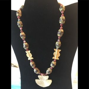 Sand beaded necklace with brass beads and pendant